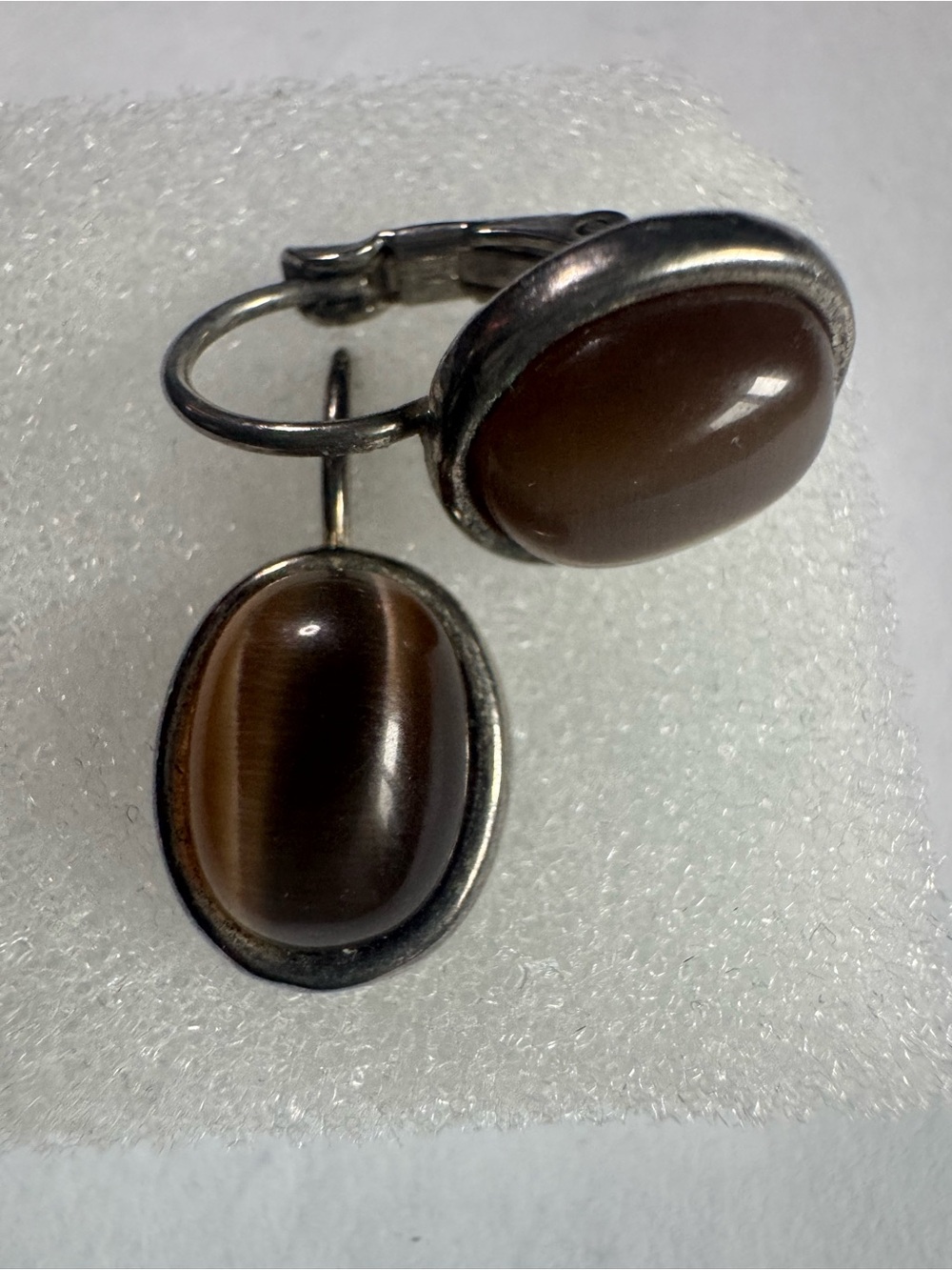 Vintage Cabochon Tiger Eye Dangle Earrings nested in silver tone. Untested